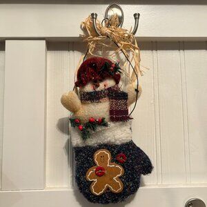 Hanging holiday decoration snowman in a glove 12" from hanger to bottom
